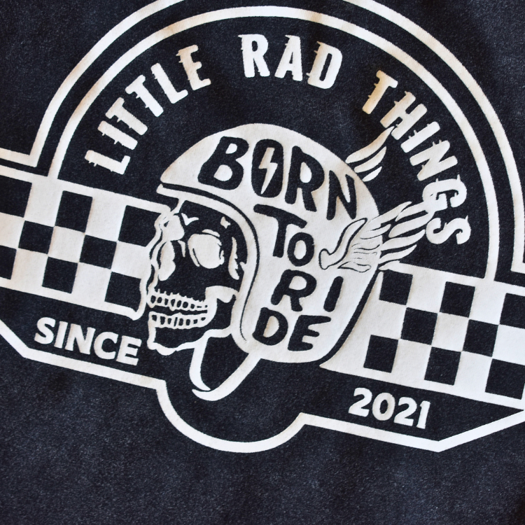 Little Rad Things toddler t-shirt featuring edgy 'Til Death Do We Ride' graphic, showcasing acid-wash texture and rebellious kid's fashion