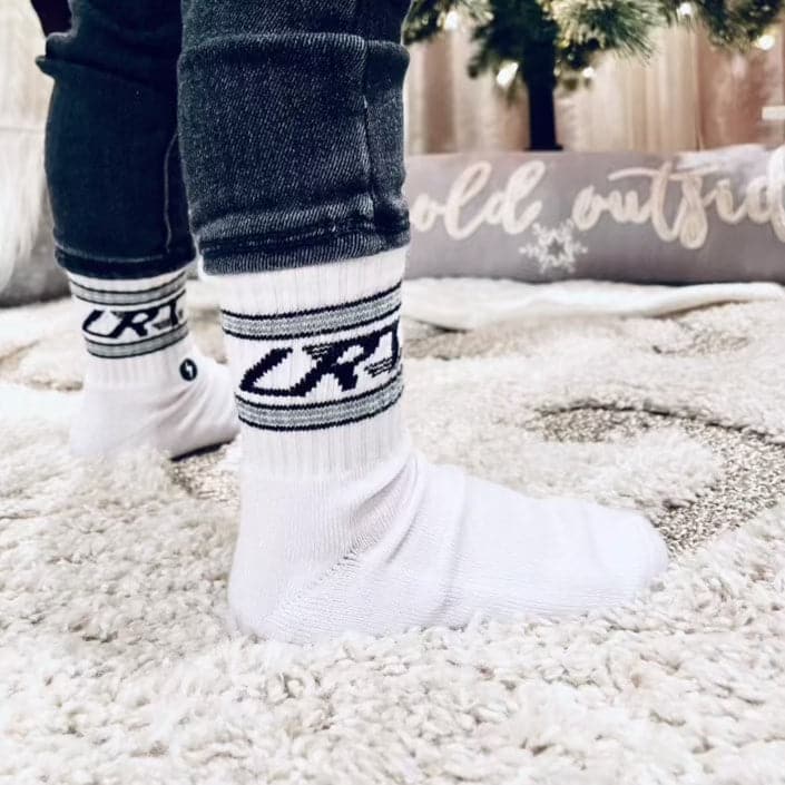 Kid's Classic Rock sock collection featuring LRT spark logo, showcasing premium cotton blend and cushioned comfort. Three-pack displayed to highlight vintage design details.