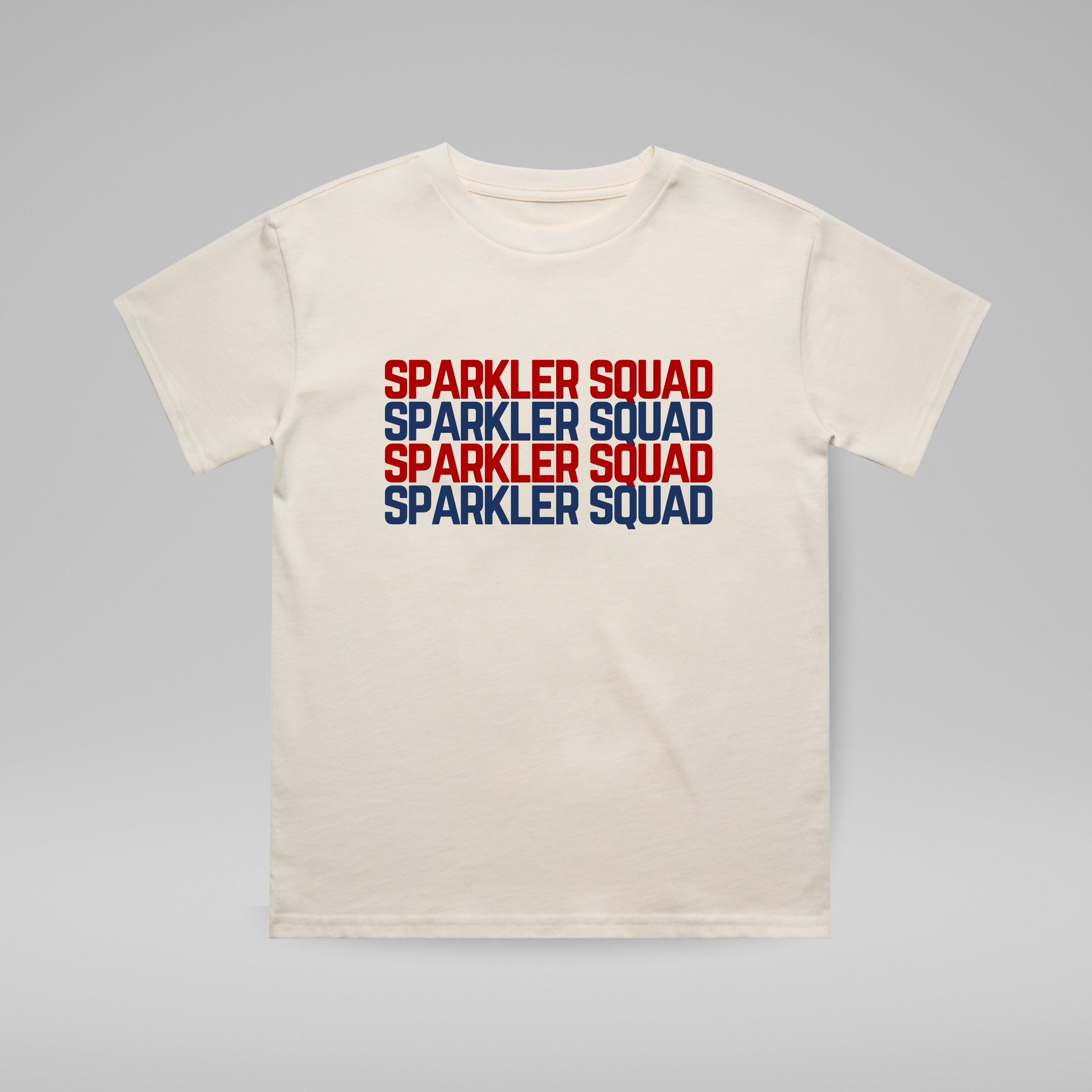 Beige t-shirt with 'Sparkler Squad' text in red and blue on a gray background