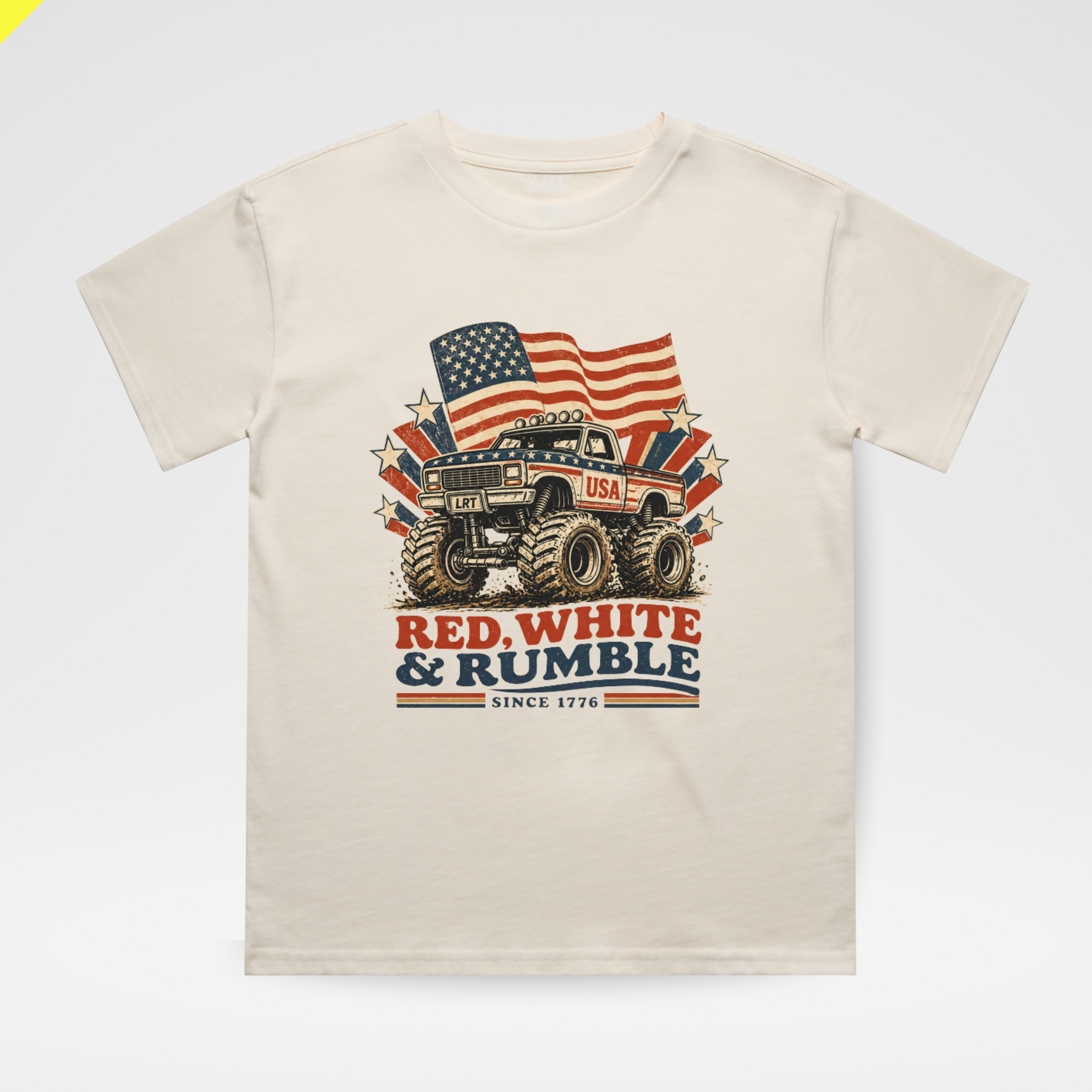 Beige t-shirt with a graphic of a monster truck and American flags on a white background