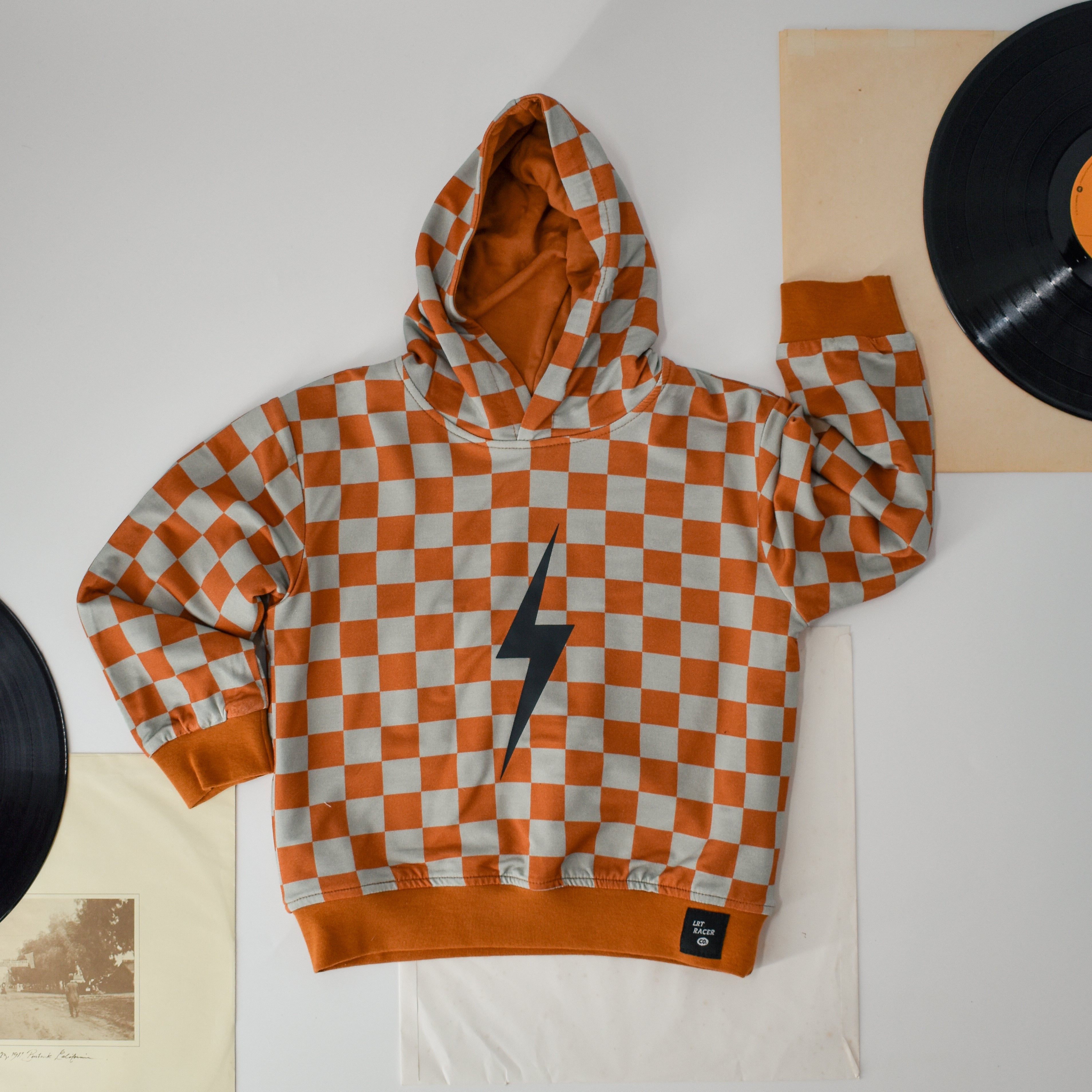 Vintage Inspired Kids Clothes, Little Rad Things, Checkered Spark Hoodie In Rust. Free US Shipping over 100.