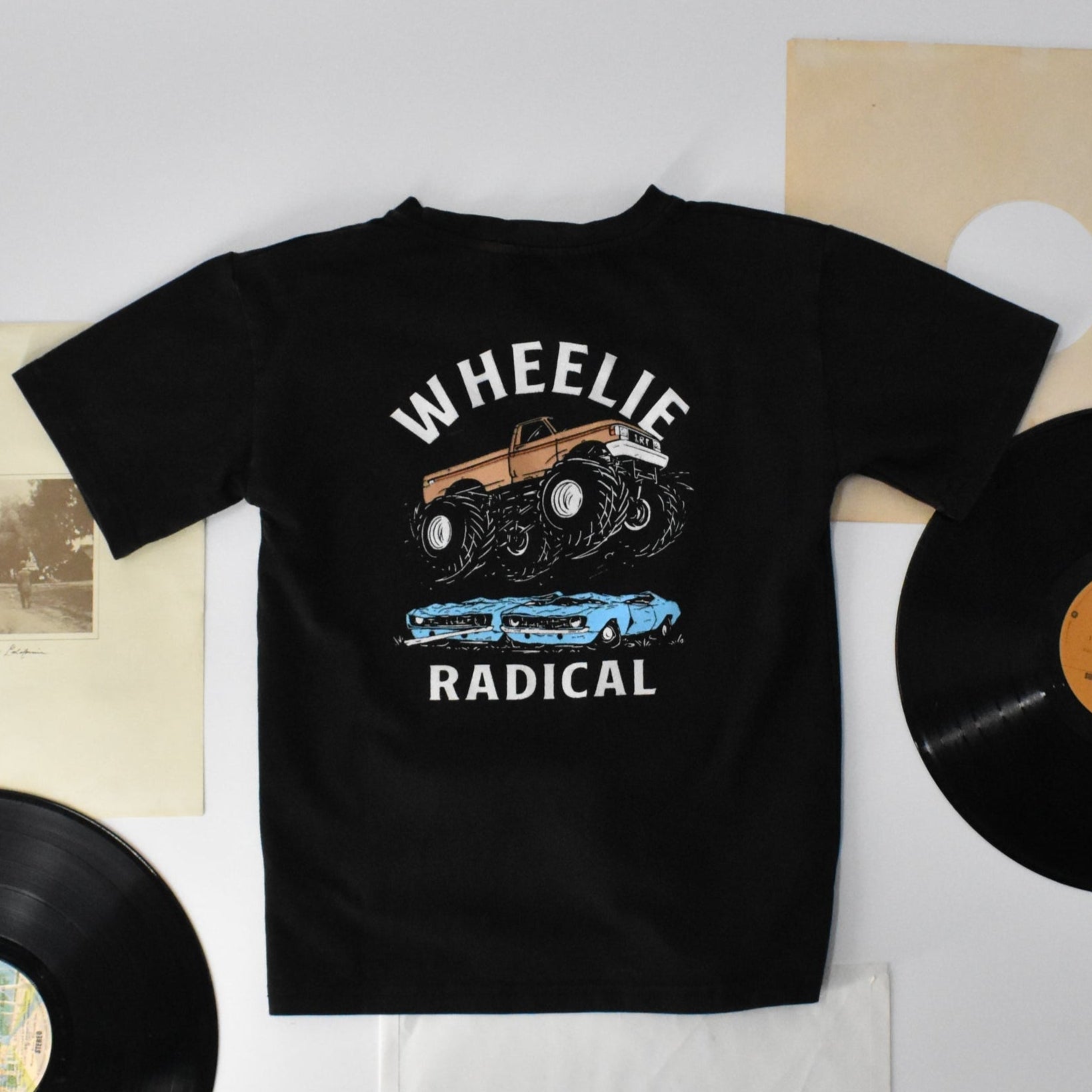 Cool infant toddler kids boys clothes retro inspired kids wheelie radical black graphic tee in blue little rad things