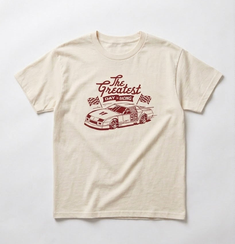 Beige t-shirt with red graphic and text on a white background