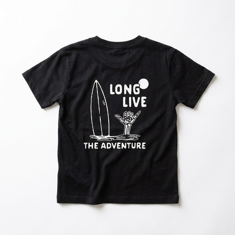 Black t-shirt with anime character design and text on a beige background