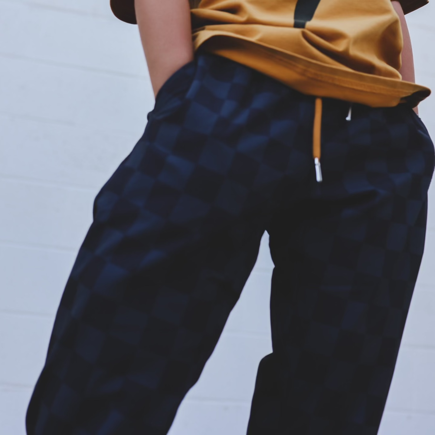 Vintage-inspired black checkered joggers boys, eco-friendly and durable