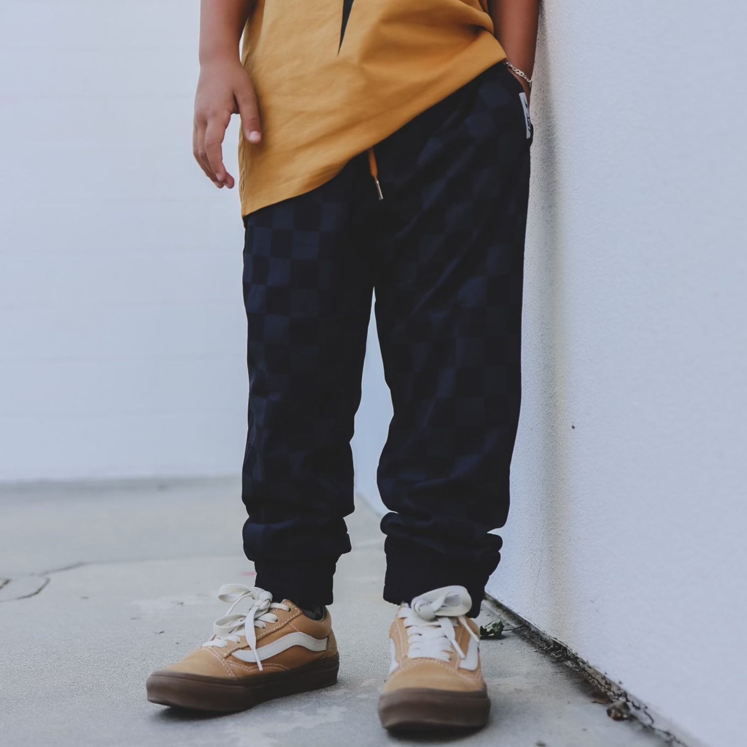 Vintage-inspired black checkered joggers boys, eco-friendly and durable