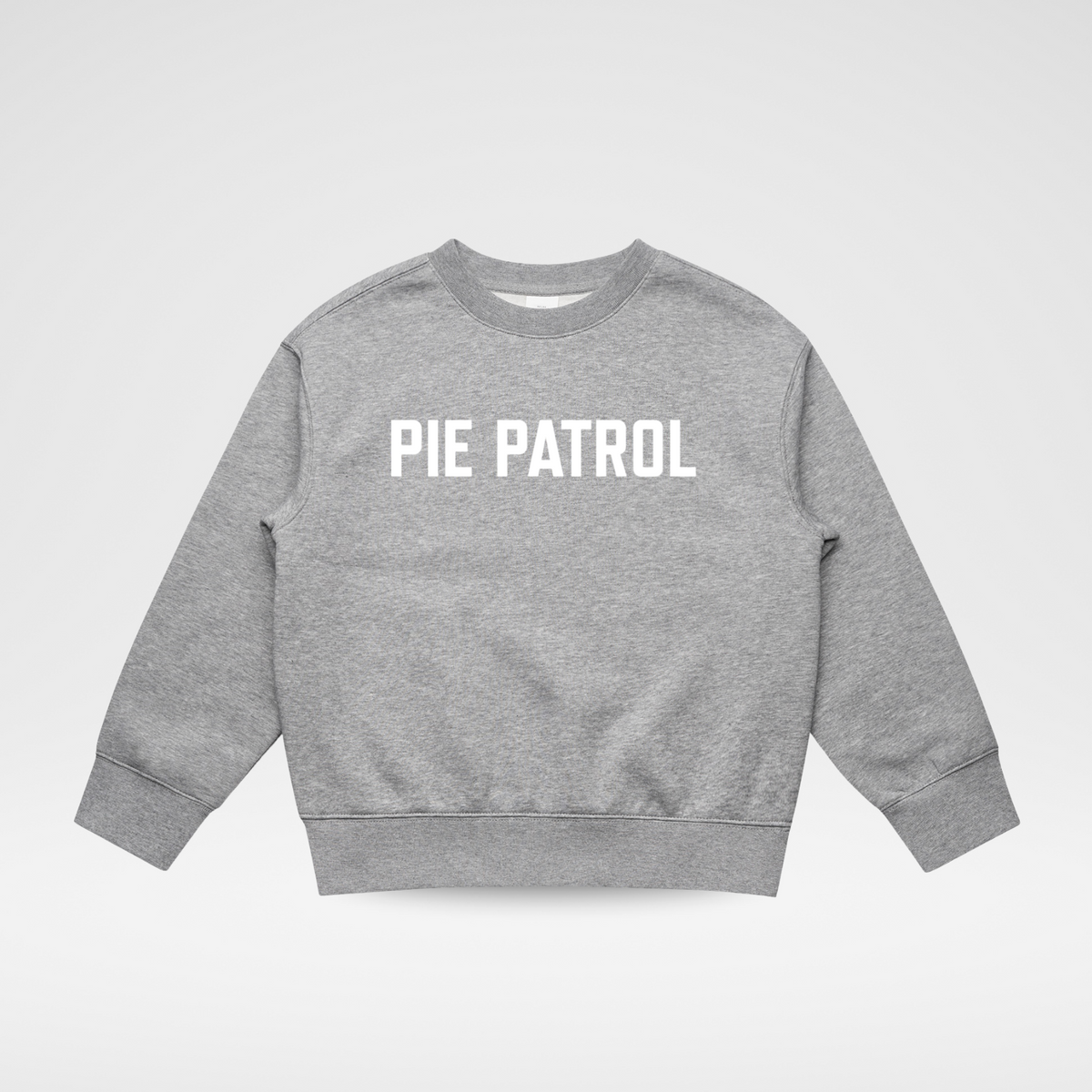 A heather gray crewneck sweatshirt with 'PIE PATROL' printed in bold white capital letters across the chest, displayed flat against a light gray background.