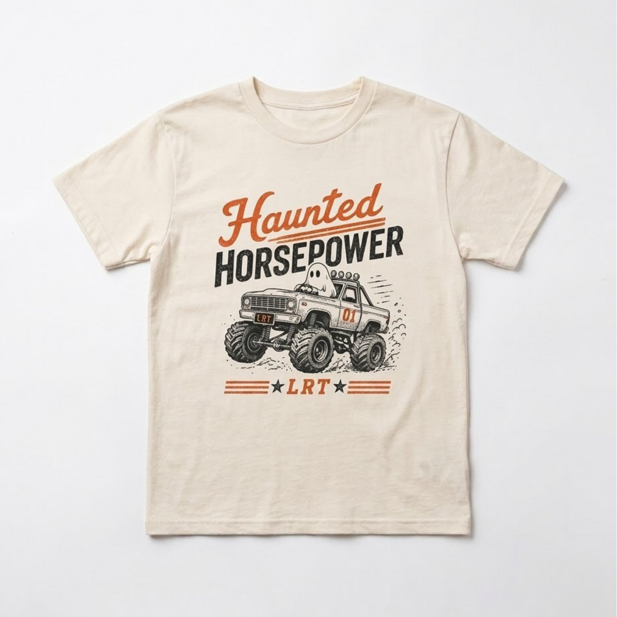 A cream-colored short-sleeve t-shirt with a vintage graphic of a monster truck and the text 'Haunted Horsepower' and 'LRT' on the front, displayed flat against a light gray background.