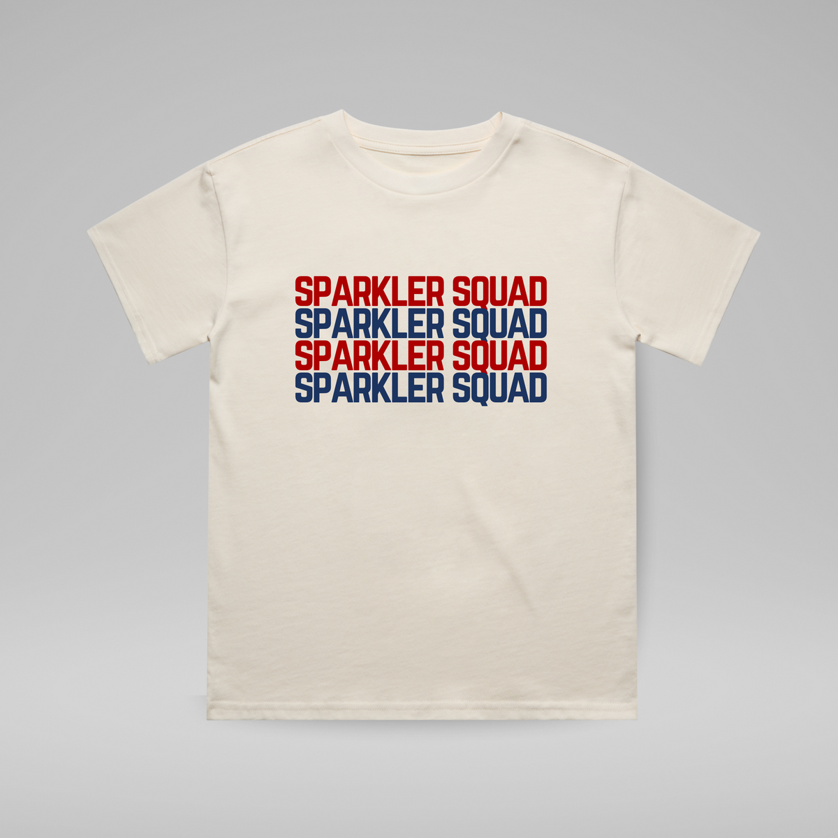 Beige t-shirt with 'Sparkler Squad' text in red and blue on a gray background