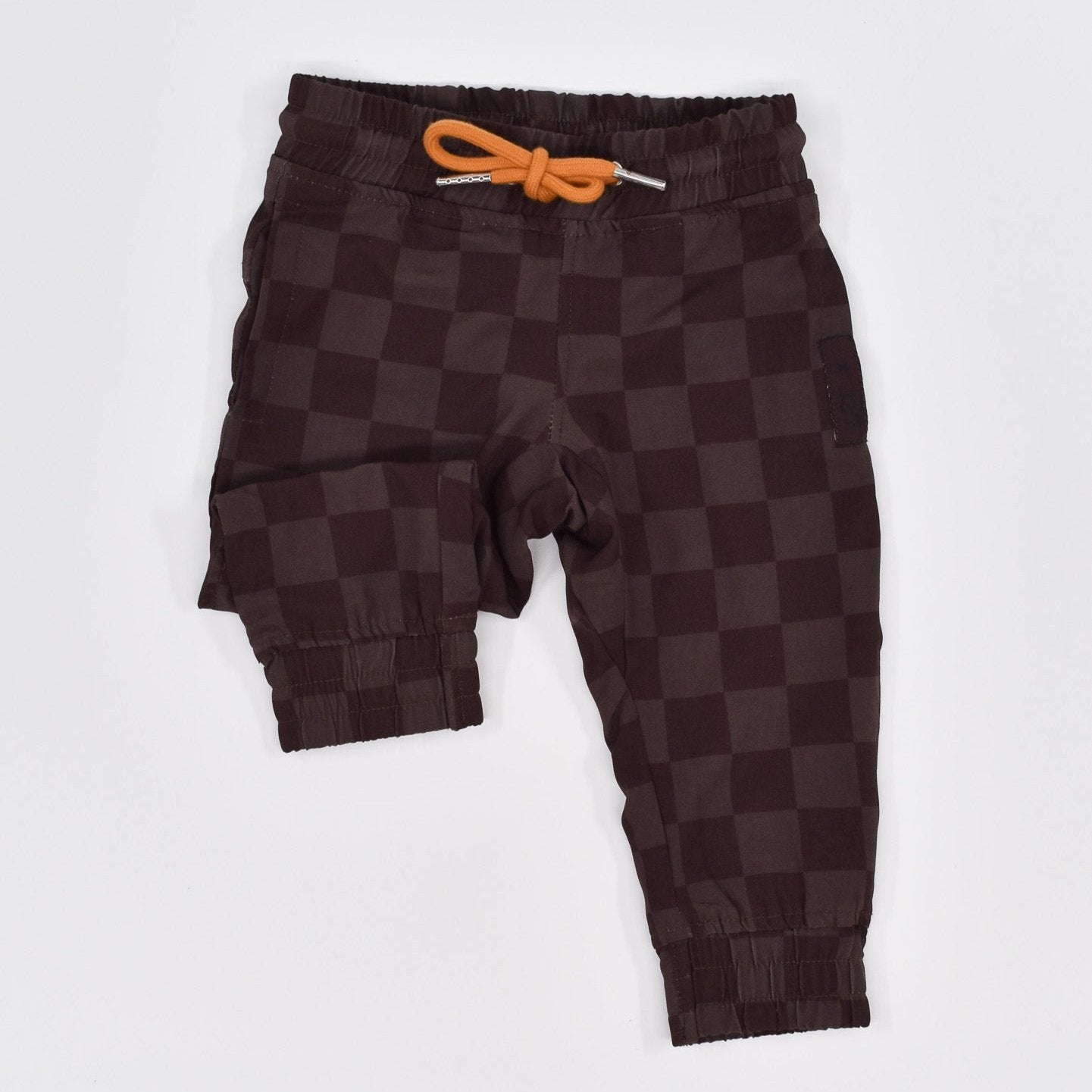 Athletic jogger in brown muted checkerboard, comfortable and durable for boys