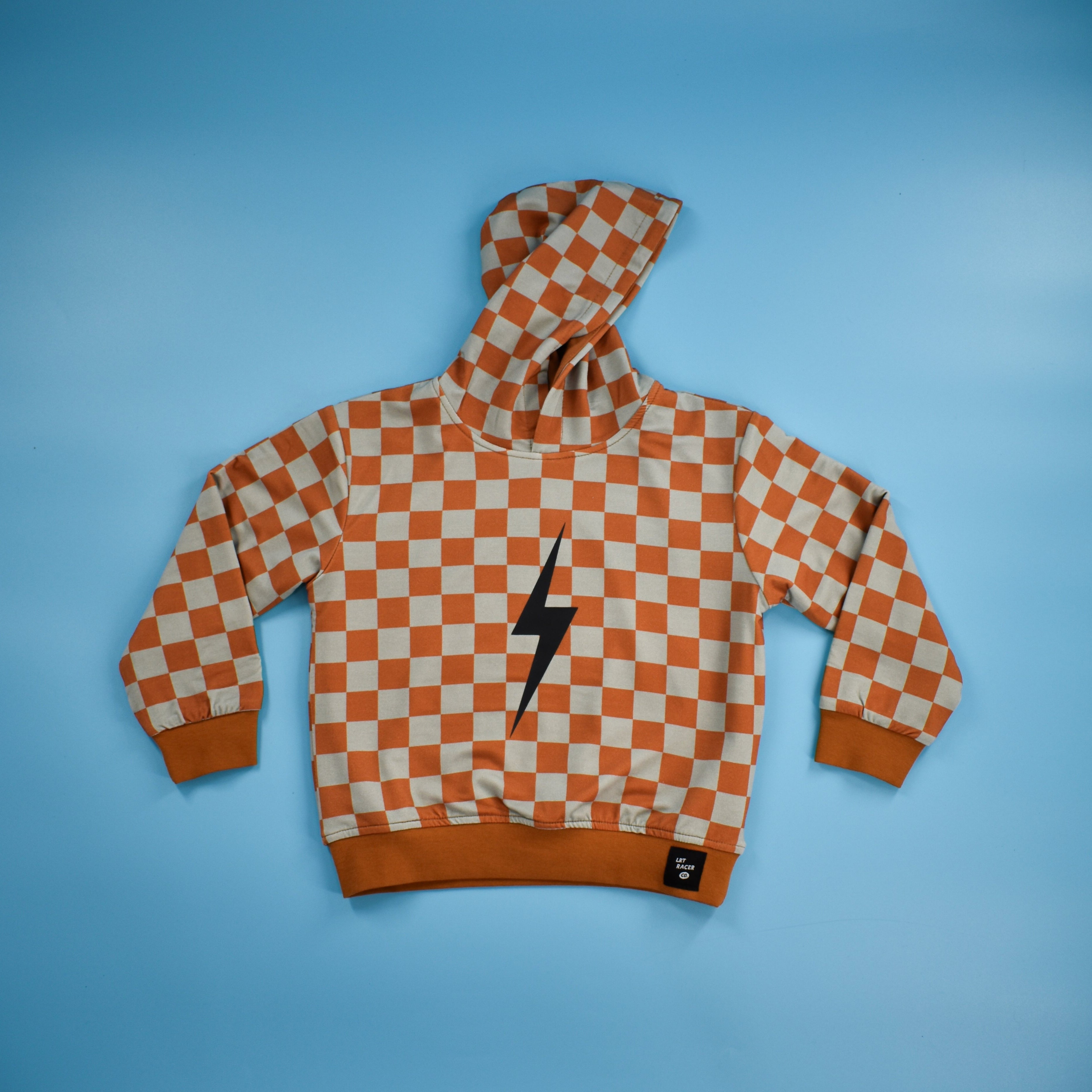 THE CHECKERED SPARK HOODIE - RUST