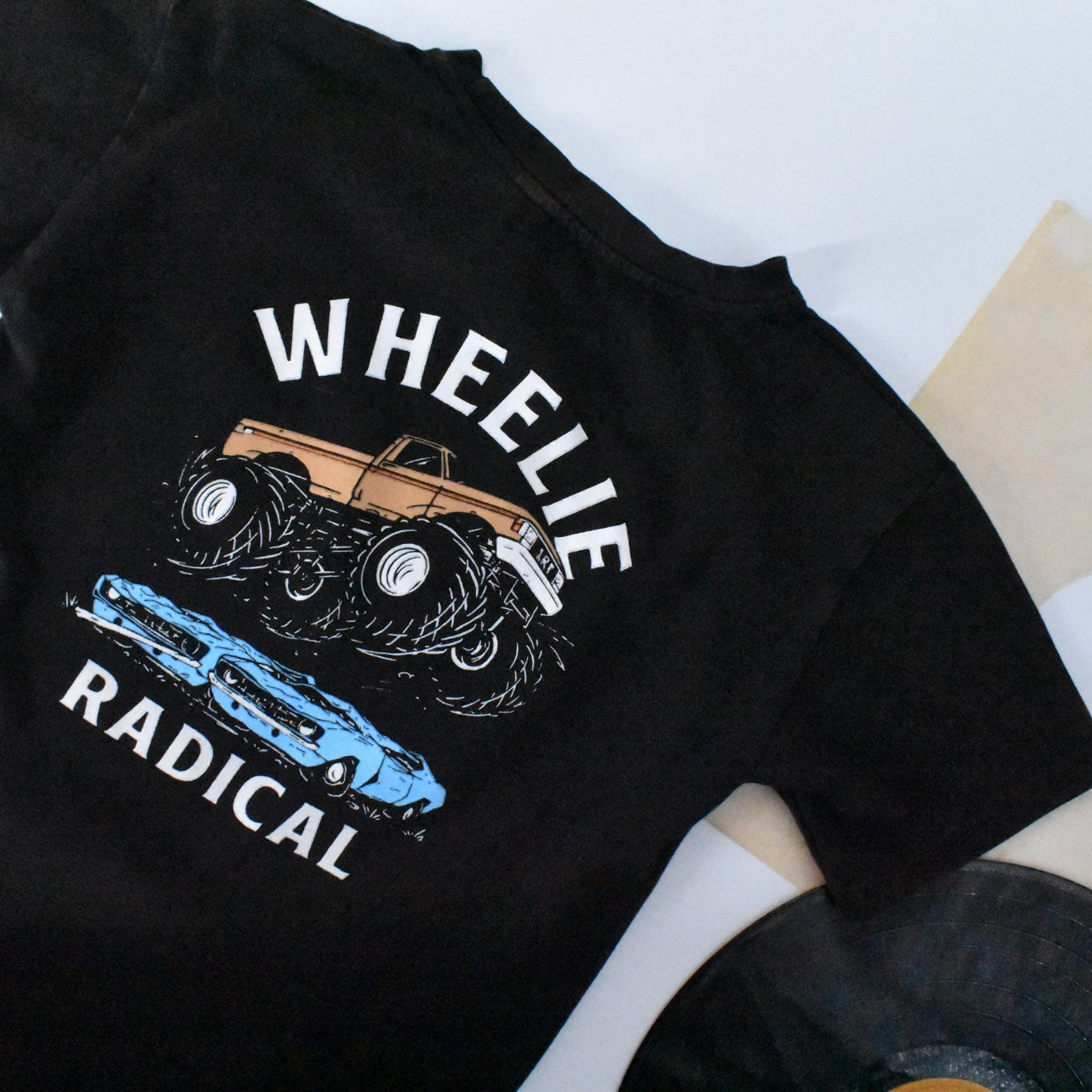 Cool infant toddler kids boys clothes retro inspired kids wheelie radical black graphic tee in blue little rad things