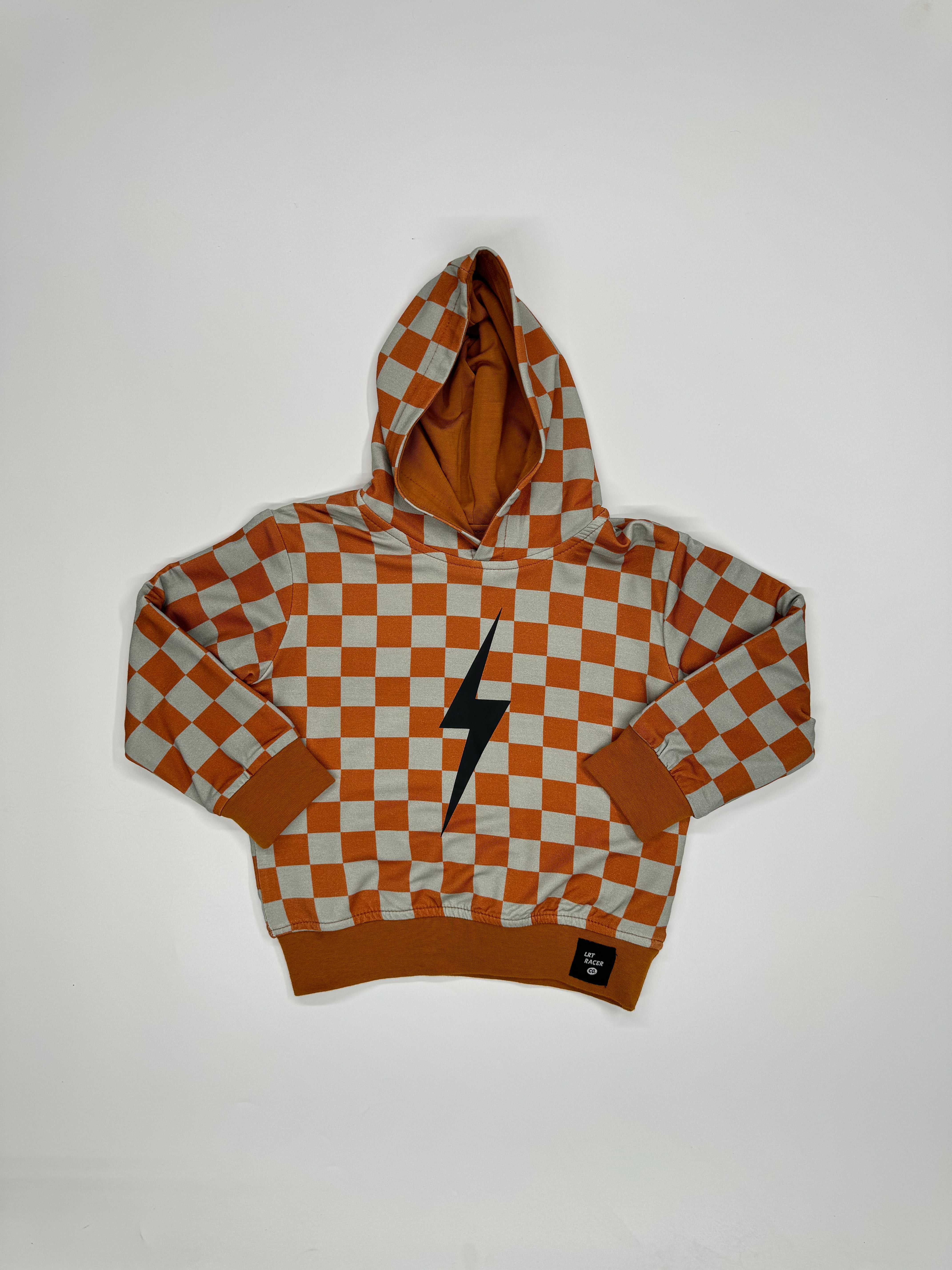 THE CHECKERED SPARK HOODIE - RUST