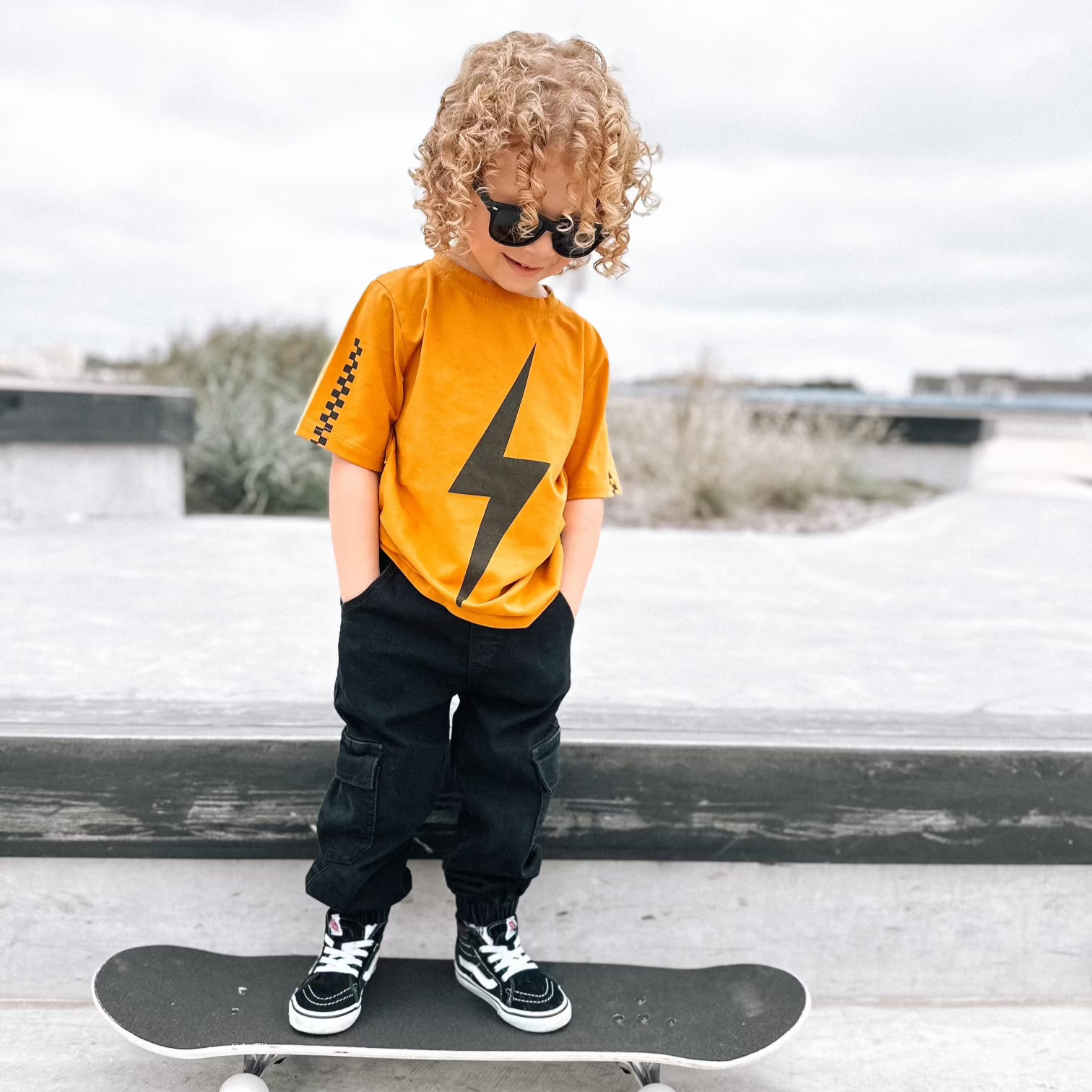 Limited Edition Spark short sleeve racer tee in pumpkin, eco-friendly and retro-inspired for boys